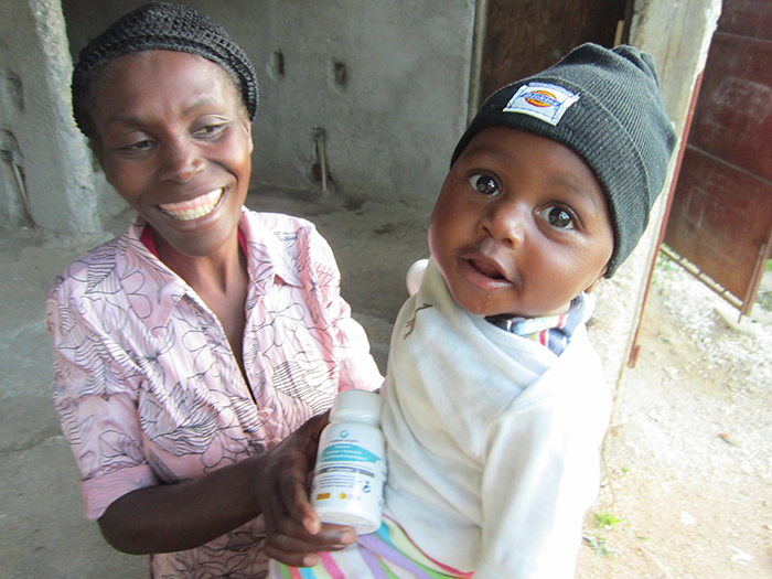 Rose & Godson receiving medical care through Haitian Families First